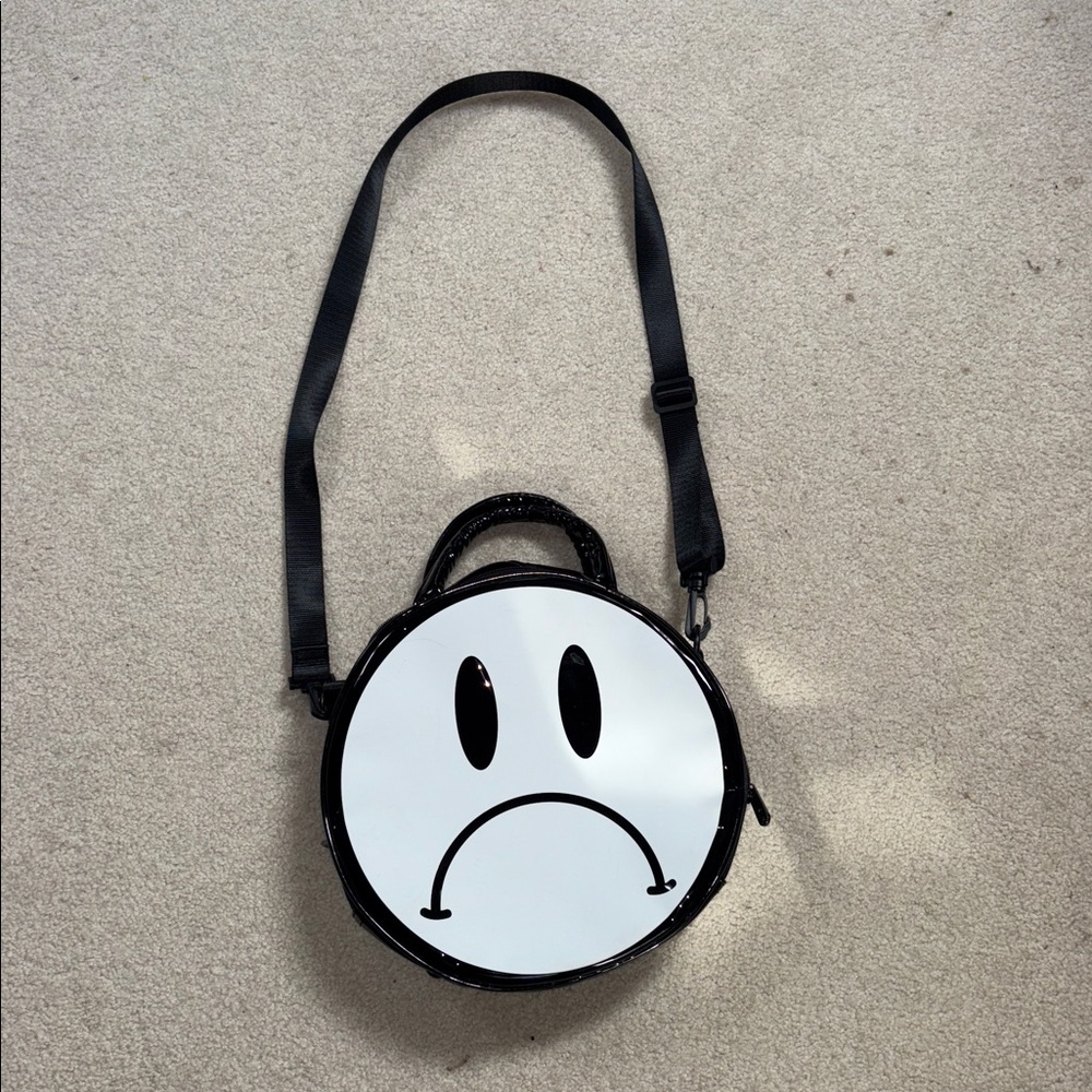 Killstar pocketbook . Polyester., handles and strap. Zippered